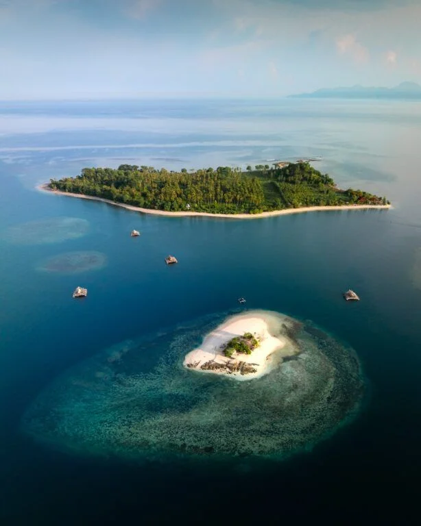 Lombok Snorkeling Tour Gili Kedis highlighting a tiny heart-shaped island with pristine white sand and shallow turquoise water.